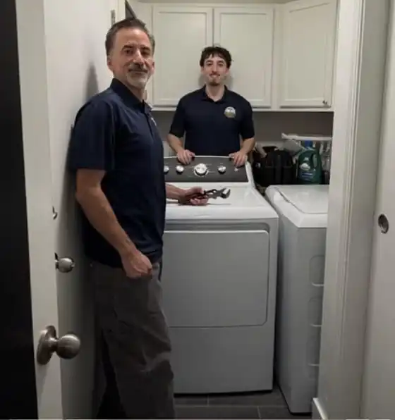 Andrew and his dad after an install