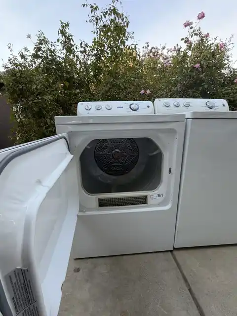Dryer with the door open, checked before delivery