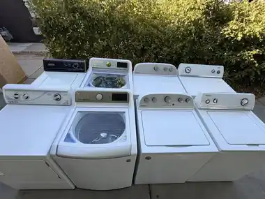 Washer and dryer sets lined up, cleaned and tested